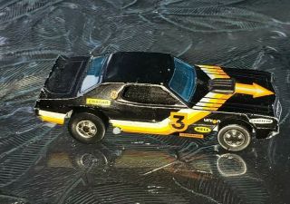 1974 Black Hot Wheels Ford Torino With An Arrow On The Hood