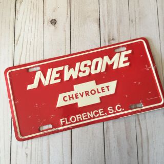 Vtg Dealer Tag Newsome Chevrolet Auto Dealership Metal Florence Sc Red Plate