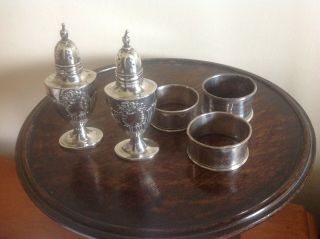 Solid Silver: 2 Pepper Pots Both W Hutton And 3 Napkin Rings.  Diff.  Dates 122g