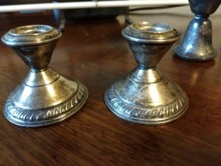 Two pairs of weighted sterling candle holders 4