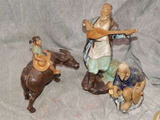3 Mud Man Figures,  Ox W/girl,  Musician,  Fisherman