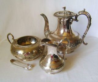 Antique Silver Plated Tea Pot With Greyhound Finial,  And Jug,  Sugar Bowl & Tongs