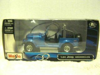 2013 Maisto Jeep Wrangler 1:24 Scale (blue) Die - Cast