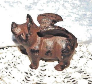 When Pigs Fly Cast Iron Flying Pig Paperweight 3 1/2 " Rust Tone Vintage Finish
