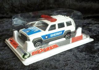 Majorette 285 Jeep Cherokee " Sheriff " With Lighter Blue Tampos