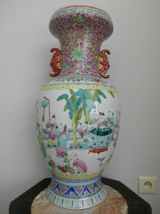 A Large Chinese Famille Rose Vase With A Decoration Of Playing Children
