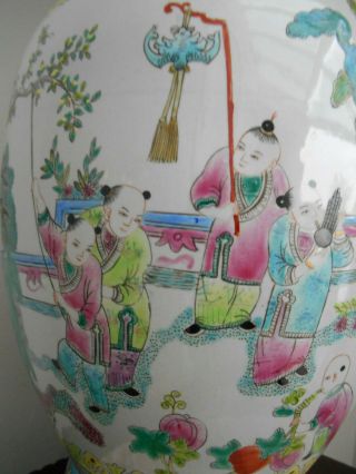 A large Chinese famille rose vase with a decoration of playing children 7