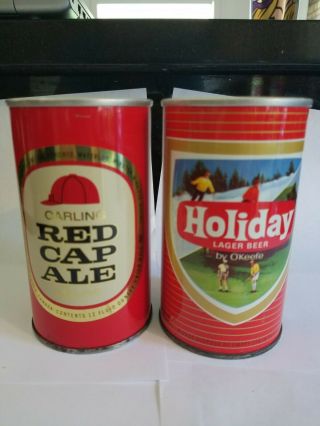 2 older canadian cans - Holiday and red Red Cap Ale 2