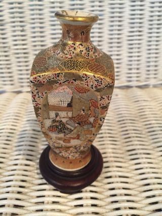 Antique Japanese hand painted porcelain miniature vase,  marked. 4