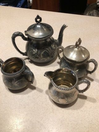Antique Richfield Quadruple Plate Creamer,  Sugar Bowl,  Syrup Pitcher,  And Tea Po