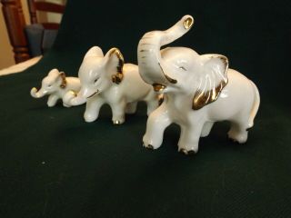 Vintage set of 3 Elephants,  White Porcelain with Gold Accents.  Made in Japan 3