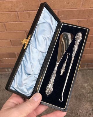 A Quality Cased Set Of Antique Solid Silver Button Hooks & Shoe Horn,  1898.