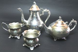 A Vintage Four - Piece Silver Plated Tea & Coffee Set England