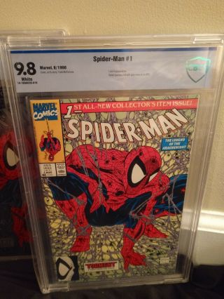 CBCS 9.  8 Spider - Man 1 (Green,  Silver,  & Gold),  CBCS 9.  8 Spider - Man 13 McFarlane 2
