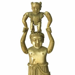 A Fine Chinese Antique Carved Toy Figure Of Man Lifting Child Above Head