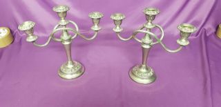 A Matching Vintage 3 Branch Candleabras With Elegant Embissed Patterns.