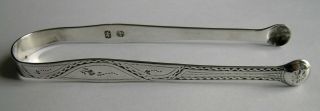 Hester Bateman: A George Iii Silver Sugar Tongs,  Incuse Duty Mark 1784 - 6
