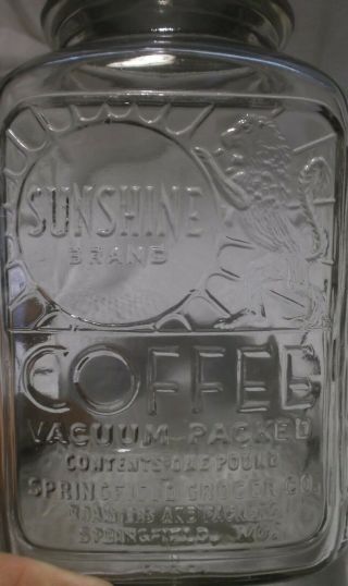 1 Lb.  Sunshine Coffee Jar Springfield Grocer Co. ,  Mo Glass W/zinc Lid Lion Sun