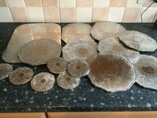 A large selection of 15 silver plated Place mats & coasters 2