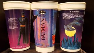 Batman Returns 2 Taco Bell Drink Cups and one McDonald ' s Drink Cup 2