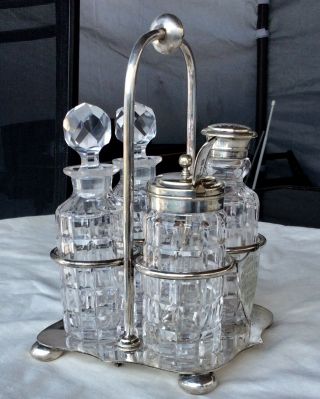 Antique 1894 - Silver Plated Cruet Set,  With 4 Cut Glass Bottles,  Spoon