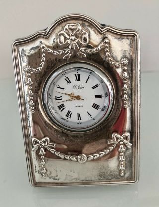 A Silver Vintage Hallmarked Frame With A Clock In The Centre