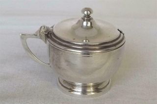 A Solid Sterling Silver Mustard Pot With Blue Glass Liner Birmingham 1942.