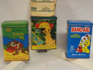 Lion King Band - Aid Metal Tin & 2 Bandages.  Loony Tunes Metal Tin