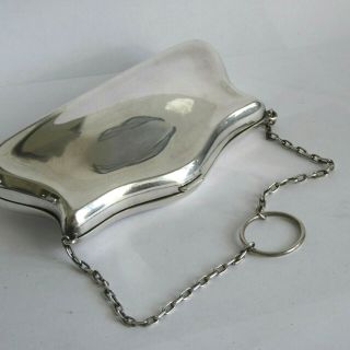 EDWARDIAN SILVER PLATE EPNS PURSE WITH CHAIN AND FINGER LOOP AND IS SILK LINED 3