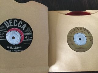 Vintage 45 RPM Record Album with 15 45 RPM single vinyl records 7