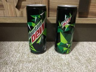 2 Empty Mountain Dew Cans 250ml,  Arabic Characters From Jordan