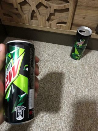 2 Empty Mountain DEW Cans 250ml,  Arabic Characters From Jordan 5