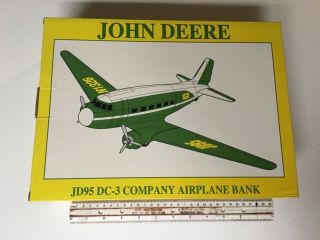 John Deere,  Douglas Dc - 3 Model Airplane Bank.  Still.