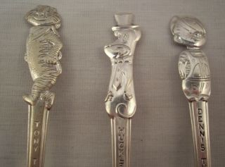 3 - Old Company Plate Souvenir Spoons International Cartoon & Kellogg Characters