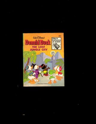 2 Books Donald Duck The Lost Jungle City,  Bugs Bunny The Last Crusader Jl23