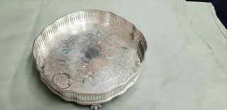 A Vintage Silver Plated Gallery Tray On Clawed Legs With Engraved Patterns.