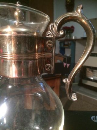 vintage claret jug.  9 & 3/4 inches high and with insert lid. 2