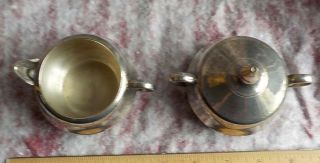 Silver colored creamer and sugar with lid,  unmarked 2