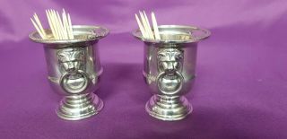 A Vintage Silver Plated Cocktail Stick Holders.  Lions Faces.