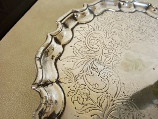 VINTAGE SILVER PLATED SALVER / TRAY 3 FOOTED.  10 INCHES DIAMETER 4