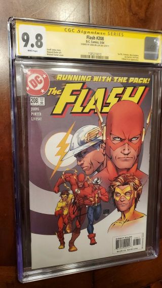 The Flash 208 Cgc Ss 9.  8 Signed By Ezra Miller