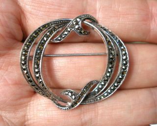 Vintage Sterling Silver Brooch With Marcasite In The Shape Of A Knot