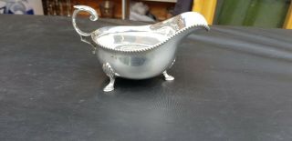 An Antique Silver Plated Sauce Boat By Harrison Brothers Of Sheffield.