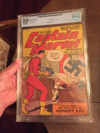 Captain Marvel Adventures 21 (feb 1943,  Fawcett) - Hitler Cover