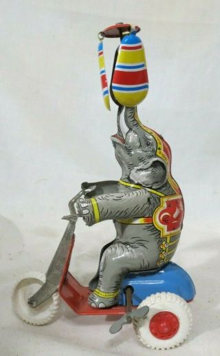 Vintage Tin Wind - Up Toy Elephant On A Scooter,  Made In U.  S.  Zone Germany,  1947