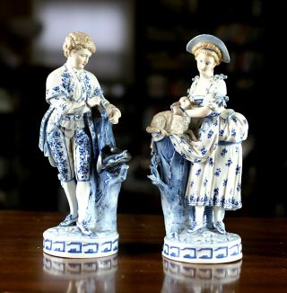 A Vintage Porcelain Figurine,  Victorian Couple,  Blue Painted,  8.  5 Inches