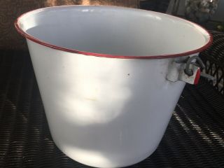 Vintage white Enamel Ware bucket w/red rim and handle (m) 3