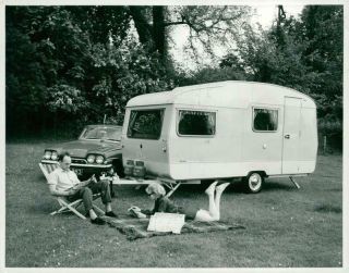 Vintage Photograph Of A Couple With Their Caravan