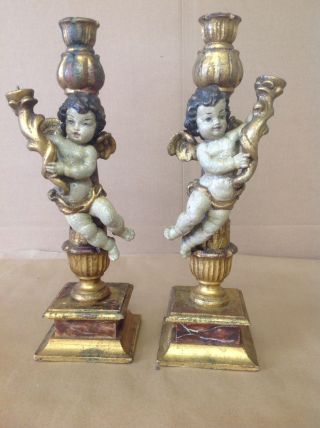 Wooden European Painted Candlesticks With Antique Carved Cherubs
