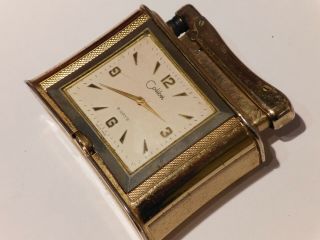 Vintage Colibri Petrol Table Lighter With Eight Day Mechanical Clock.
